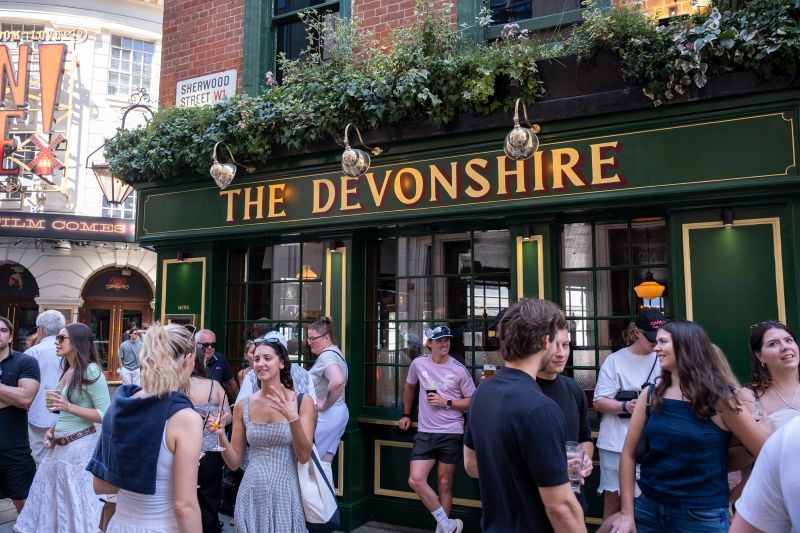 Westminster council proposes curbs on standing in Soho pubs; Downing Street defends busy pubs as 'British life' and thousands of jobs