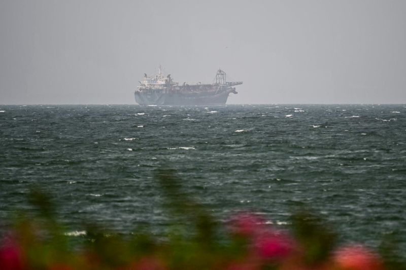 Iran denies US talks as Tehran and Oman close in on Strait of Hormuz deal; 50-50 chance by Friday, Gulf official says