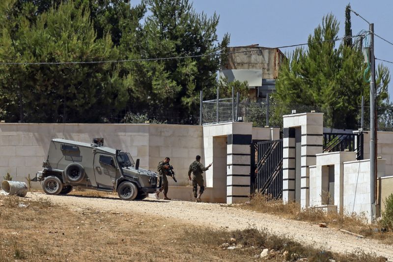 Israeli settlers lay siege to West Bank hilltop, cutting water, electricity, roads to force out Palestinian families; military reverses eviction order