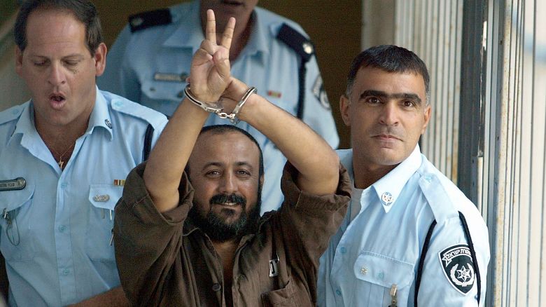 TEL AVIV - SEPTEMBER29: (ISRAEL OUT) Palestinian leader Marwan Barghouti is taken away under escort September 29, 2003 in Tel Aviv, Israel after continued proceedings in his trial in the Tel Aviv District Court. Barghouti, head of the Fatah Tanzim movement, refused to testify in his trial charging that the outcome of the court case was predetermined. Israel has charged Barghouti with leading and conducting suicide attacks on Israeli targets and is accused of murder and attempted murder. (Photo by Uriel Sinai/Getty Images) 
