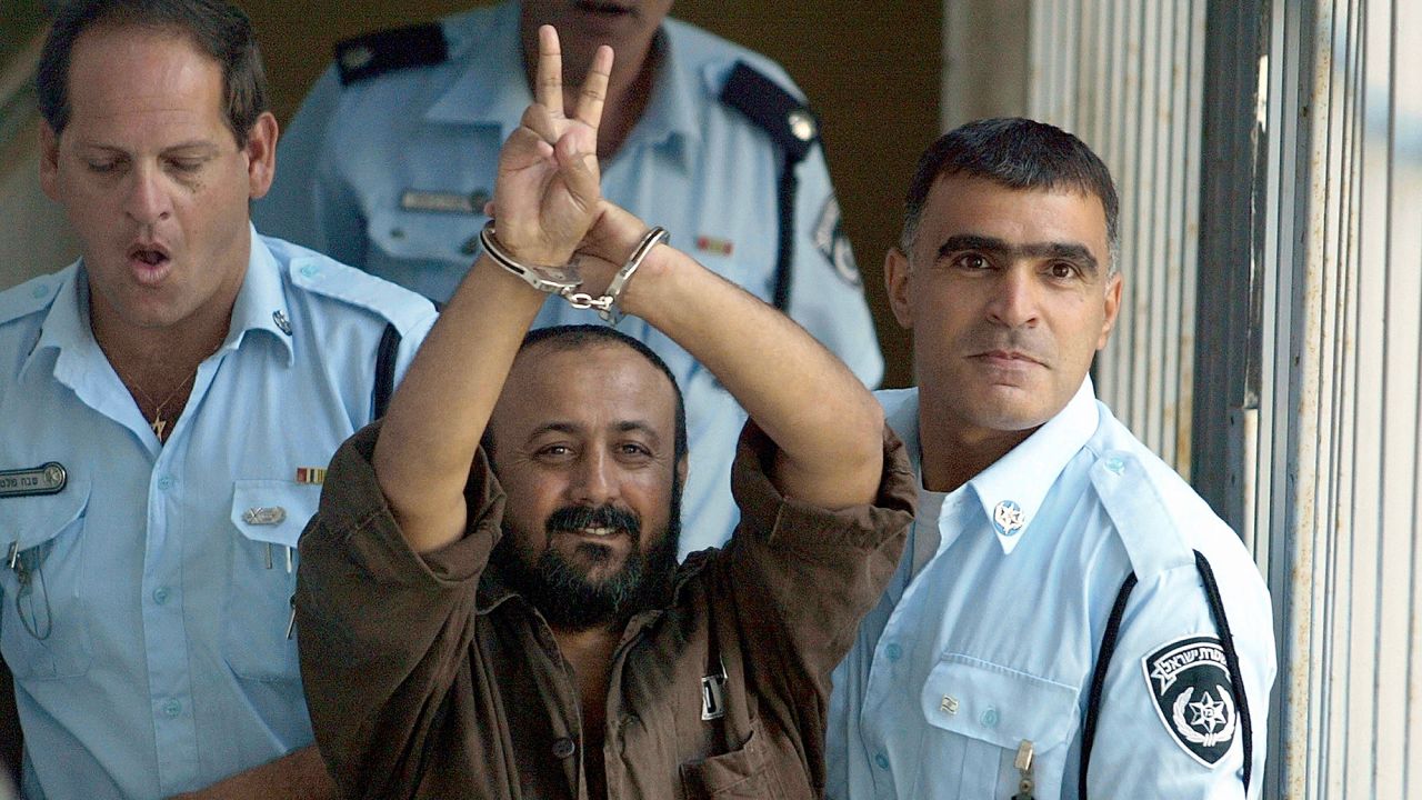 TEL AVIV - SEPTEMBER29: (ISRAEL OUT) Palestinian leader Marwan Barghouti is taken away under escort September 29, 2003 in Tel Aviv, Israel after continued proceedings in his trial in the Tel Aviv District Court. Barghouti, head of the Fatah Tanzim movement, refused to testify in his trial charging that the outcome of the court case was predetermined. Israel has charged Barghouti with leading and conducting suicide attacks on Israeli targets and is accused of murder and attempted murder. (Photo by Uriel Sinai/Getty Images)