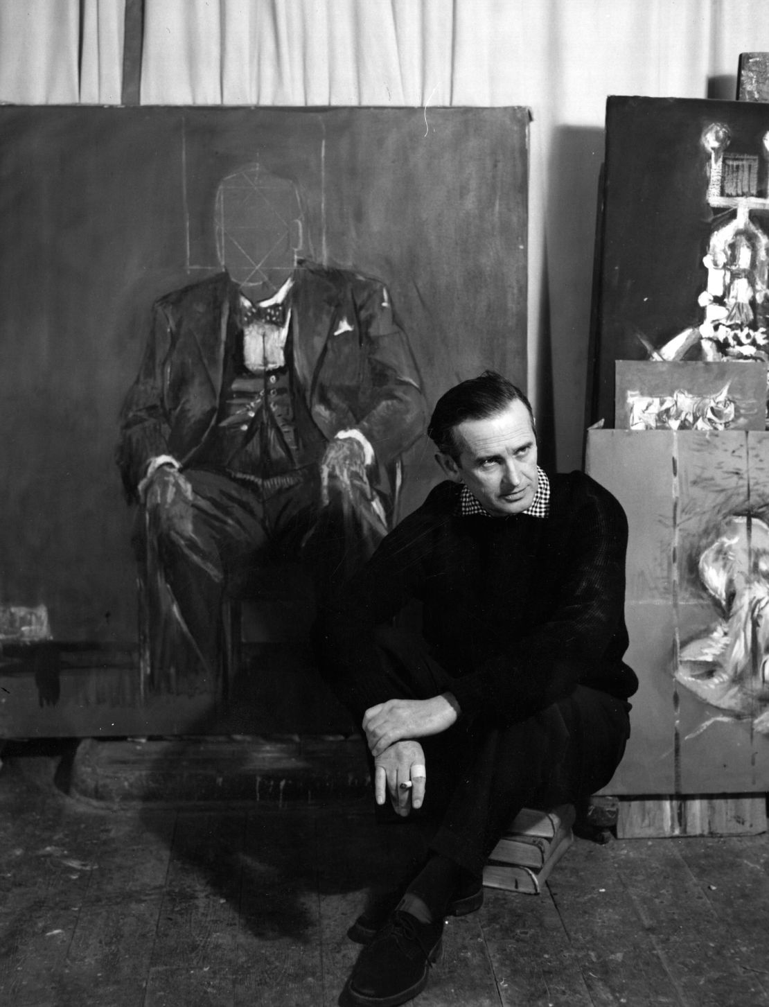 Graham Sutherland, seen with the-then unfinished but eventually much-maligned portrait of Churchill. In Netlfix's depiction of events, Churchill described his appearance in the painting as “a broken, sagging, pitiful creature,” and Sutherland as “a Judas wielding his murderous brush.”