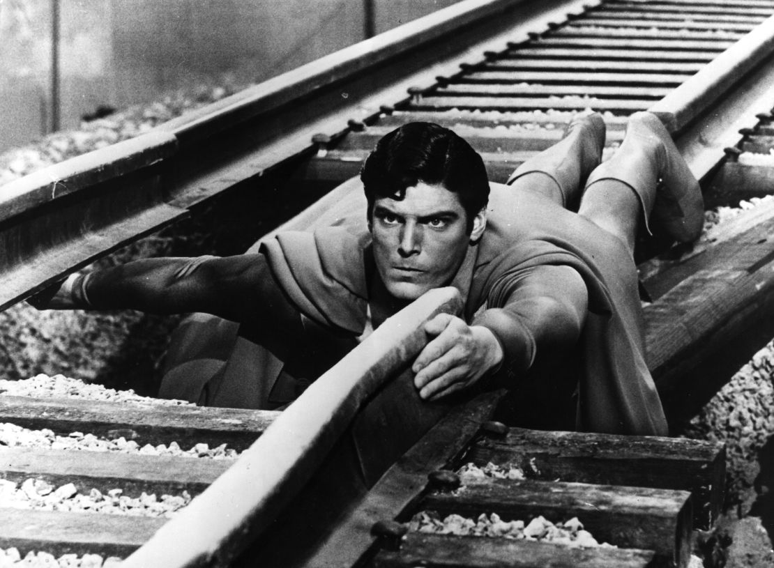 24-year-old American actor Christopher Reeve plays the comic-book hero as he mends a broken railway track in a scene from the film "Superman."