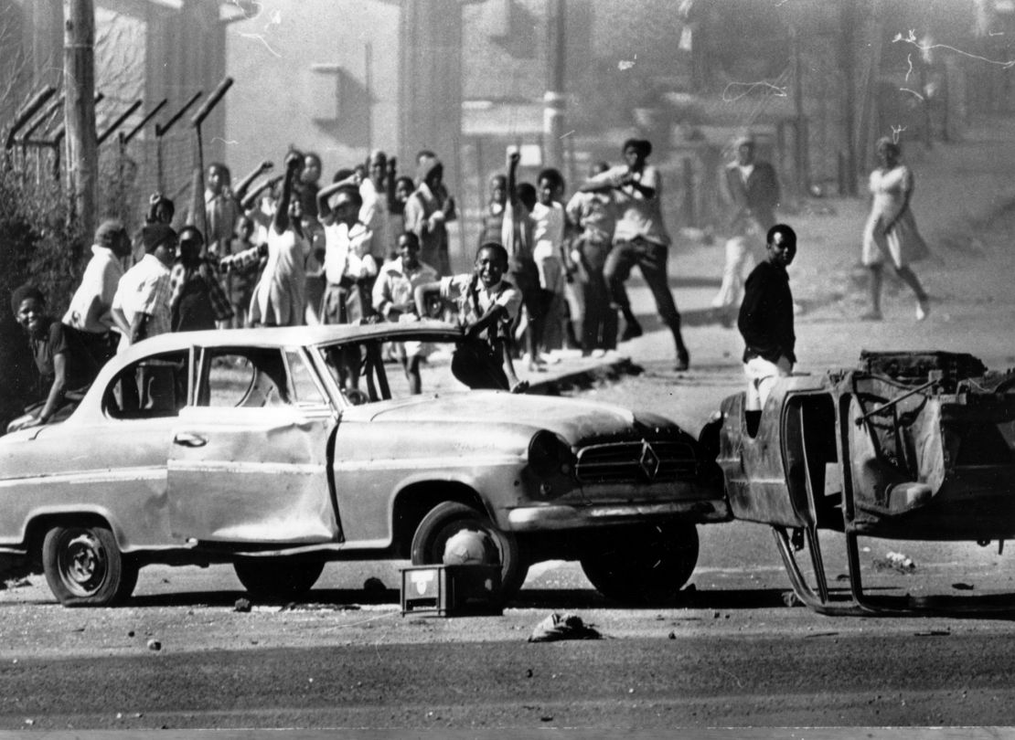 Cars are used as roadblocks on June 21, 1976, during unrest in Soweto, South Africa, stemming from protests against the use of Afrikaans in schools.