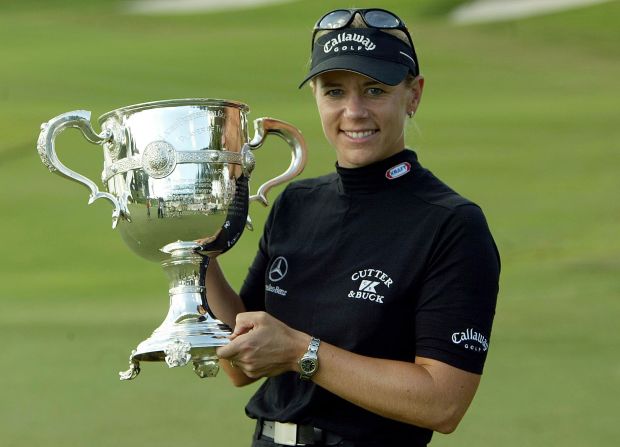 Sorenstam, pictured here holding the "Player Of The Year" trophy in 2003, has won this award eight times during her pro career, which remains the record.