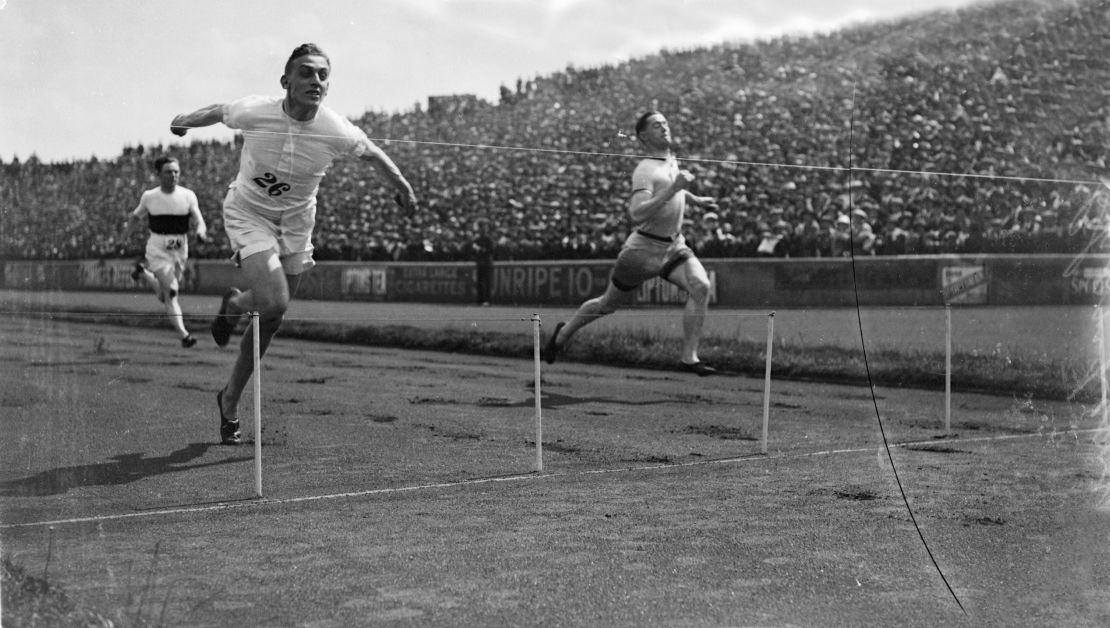 Harold Abrahams crosses the finish line at the AAA Championships in 1924.