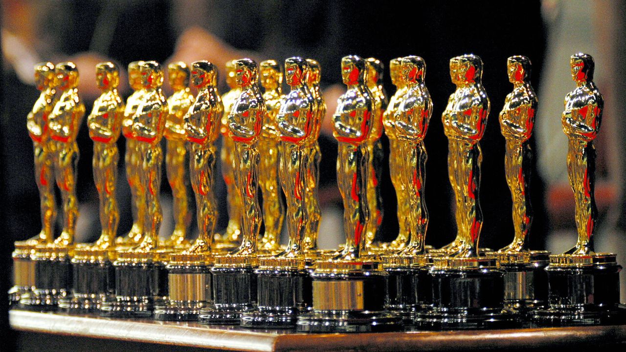 WELLINGTON, NEW ZEALAND:  The 22 Oscars won by the Lord of The Rings sit on a table in front of the 3000 assembled fans that turned out to see director Peter Jackson and the Return of The King winners during Wellington city's Oscar celebration at the Queens Wharf Event Centre, Wellington 18 March 2004. Seventeen of the Oscar winners were present with their 22 Oscars. AFP PHOTO/Dean TREML  (Photo credit should read DEAN TREML/AFP via Getty Images)