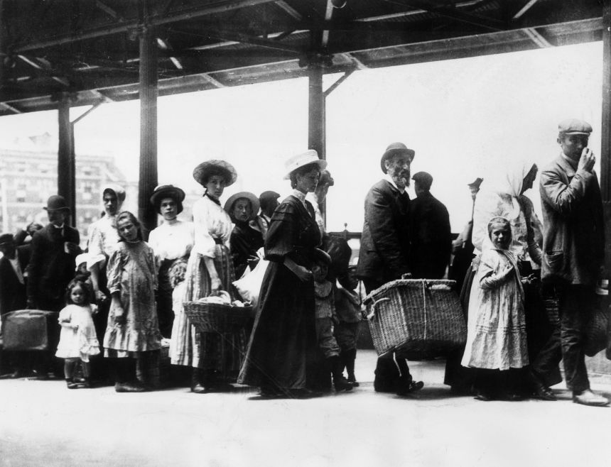 Immigrants waiting in line to pass through customs at Ellis Island, New York City, in 1905.