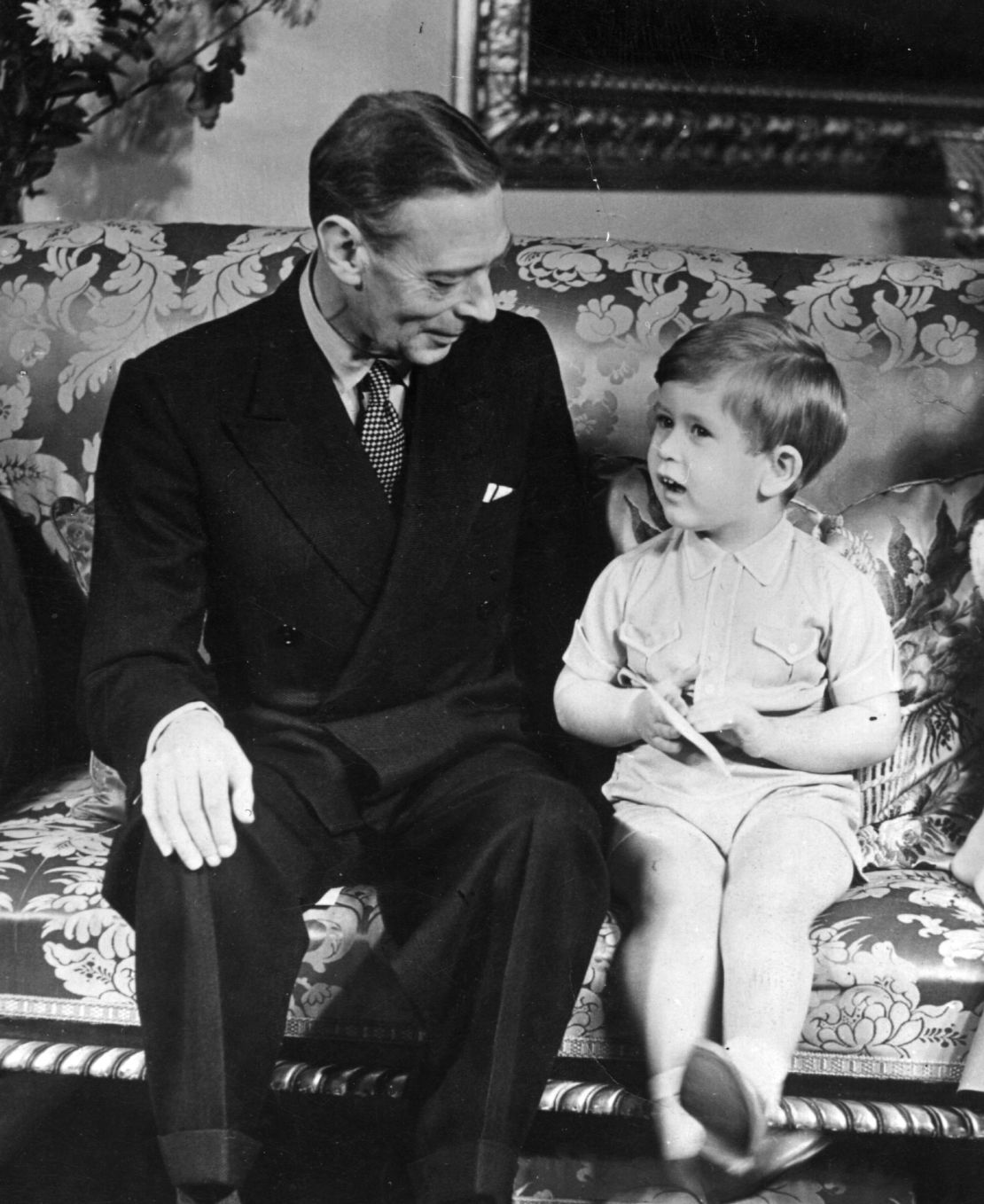 King George VI is pictured with his grandson, then Prince Charles, on his third birthday in 1951.