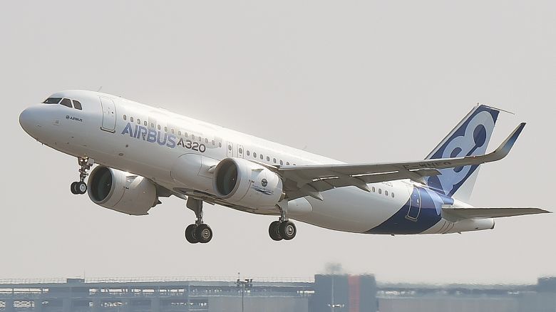 A Airbus A320neo takes off for its first test flight, on September 25, 2014 in Blagnac near Toulouse. The first outing by the A320neo  the revamped and more fuel efficient version of Airbuss most popular single aisle passenger jet  begins the test flight phase ahead of the aircrafts entry into service at the end of next year. AFP PHOTO / ERIC CABANIS        (Photo credit should read ERIC CABANIS/AFP via Getty Images)
