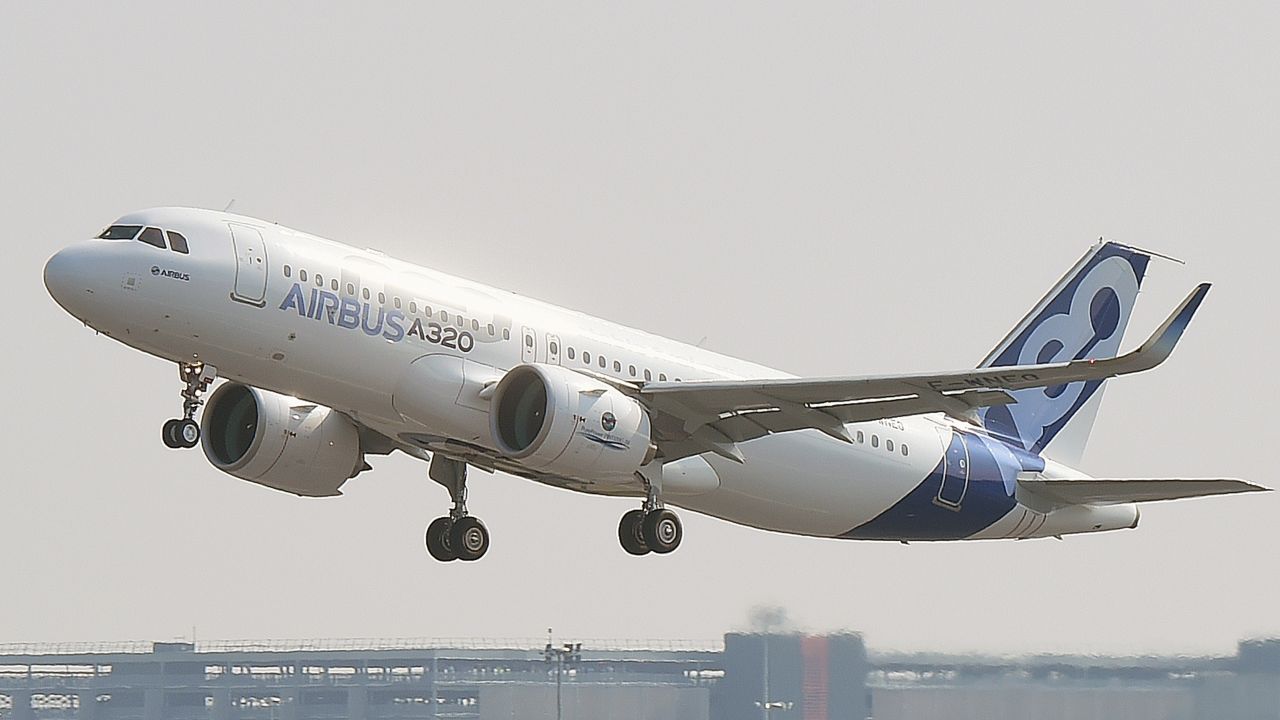 A Airbus A320neo takes off for its first test flight, on September 25, 2014 in Blagnac near Toulouse. The first outing by the A320neo  the revamped and more fuel efficient version of Airbuss most popular single aisle passenger jet  begins the test flight phase ahead of the aircrafts entry into service at the end of next year. AFP PHOTO / ERIC CABANIS        (Photo credit should read ERIC CABANIS/AFP via Getty Images)