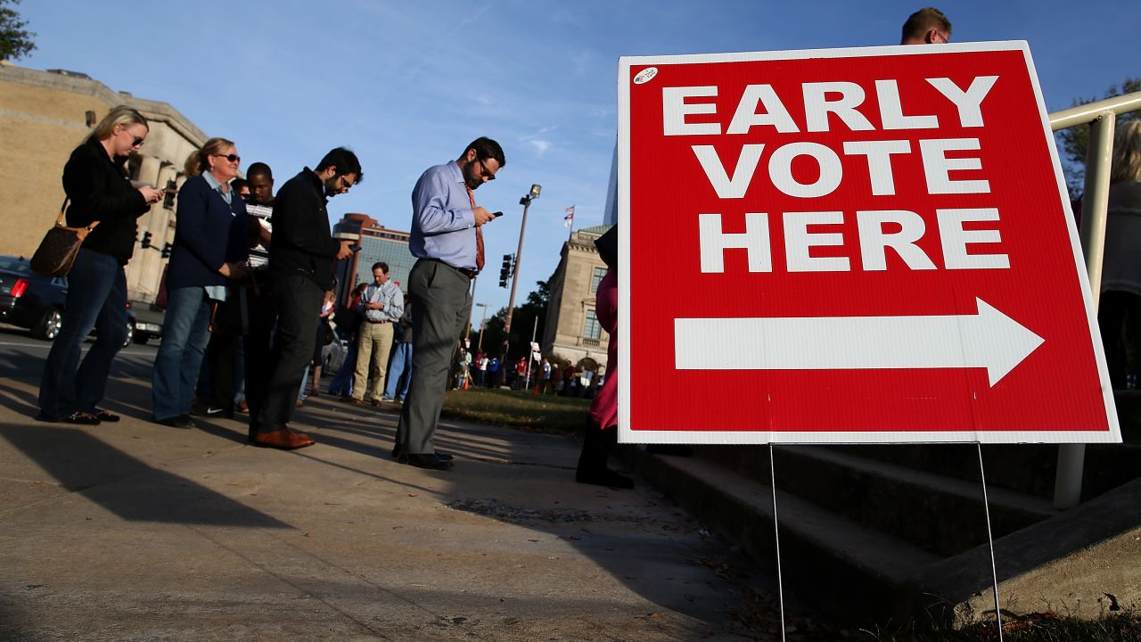 LITTLE ROCK, AR - NOVEMBER 03:  People line up for early voting outside of the Pulaski County Regional Building on November 3, 2014 in Little Rock, Arkansas. With one day to go before election day that has several very tight races for local and national office, hundreds of voters lined up for early voting.  (Photo by Justin Sullivan/Getty Images)