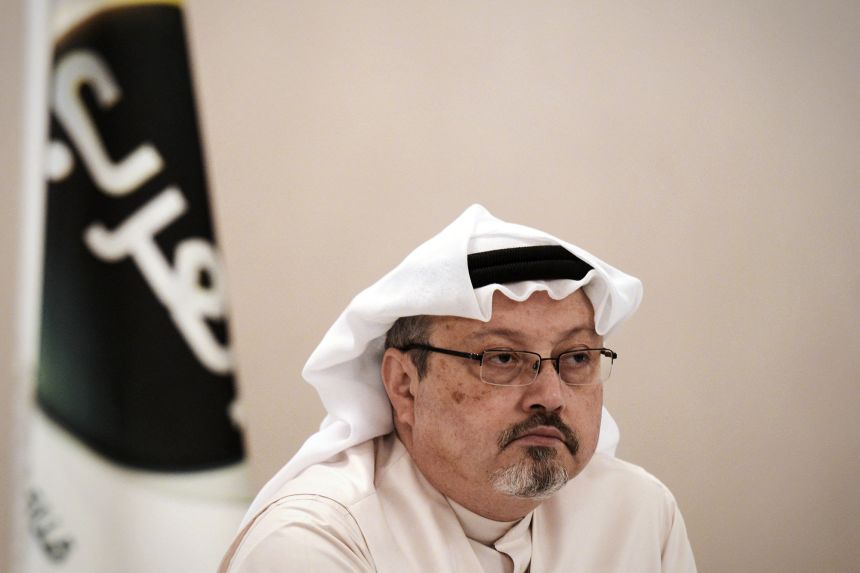 Jamal Khashoggi looks on during a press conference in Bahrain on December 15, 2014.