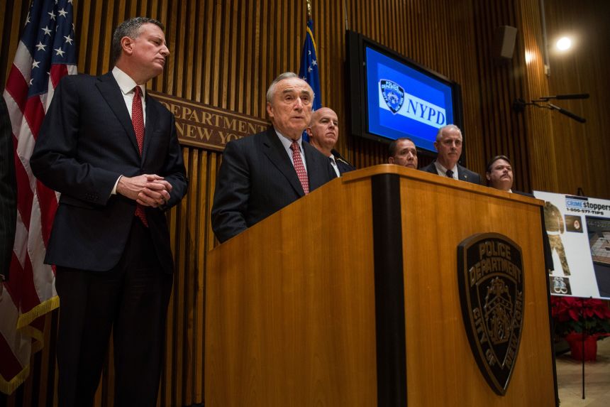 New York City Mayor Bill de Blasio, left, and New York Police Department Commissioner Bill Bratton attend press conference on December 22, 2014, in New York.