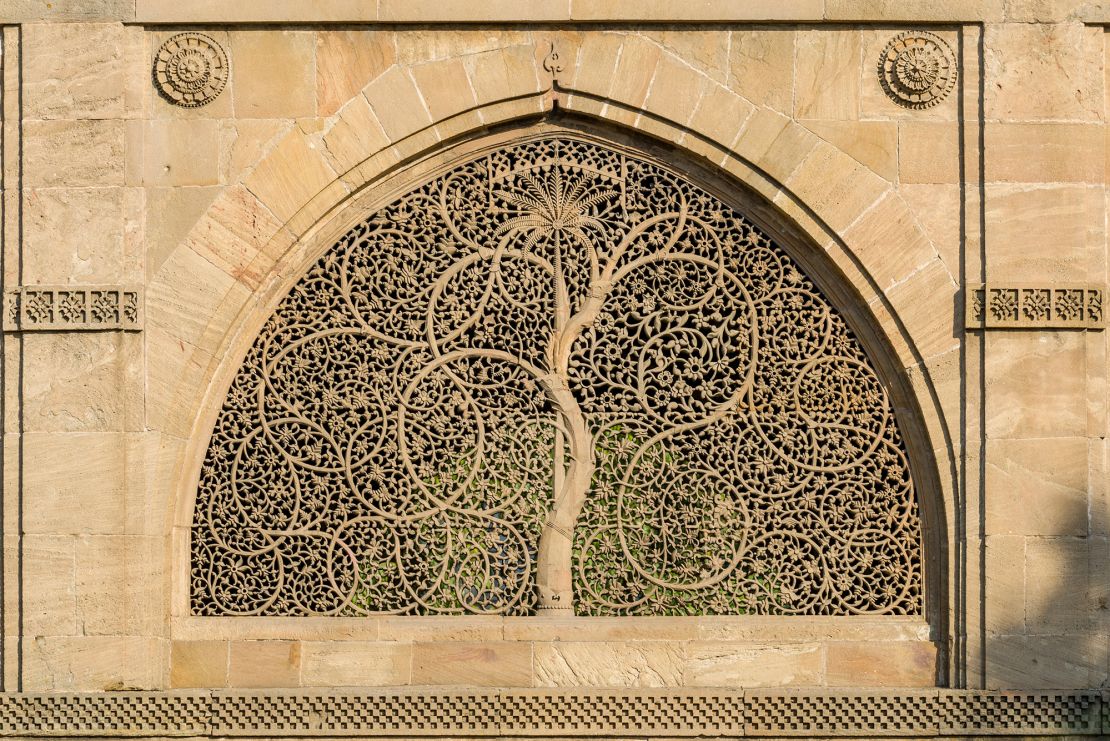 Shown here is one of the artfully carved windows of the Sidi Saiyyed Mosque in Ahmedabad, India, which depicts a tree.