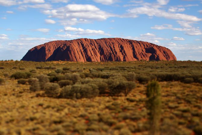 <strong>Uluru-Kata Tjuta National Park</strong>: A view of the sacred monolith of Uluru, one of Australia's most iconic natural landmarks. Passengers traveling on "the Ghan Expedition" can pay for an optional flight excursion for a chance to see the large sandstone formation from the air.