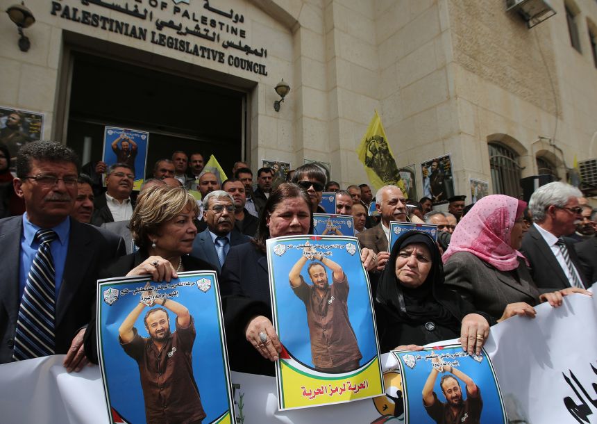 Fadwa Barghouti (C), the wife of Marwan Barghouti attends a march to mark the anniversary of his arrest in the West Bank city of Ramallah on April 15, 2015.