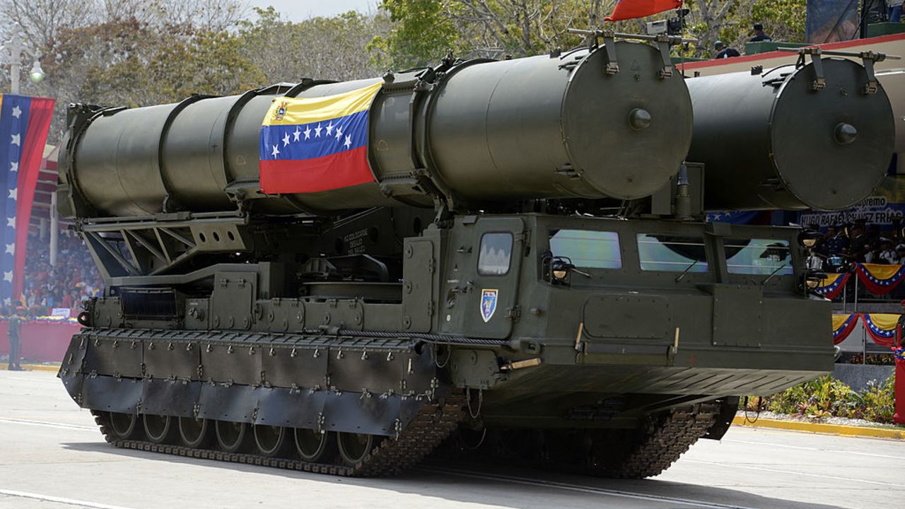 Venezuelan Army's Russian-made missile carrier during a military ceremony to commemorate President Hugo Chavez's death first anniversary, in Caracas on March 5, 2014. The Venezuelan government commemorates the first anniversary of Chavez's death with a civic-military parade, accompanied by Latin American heads of state, amid opposition protests that met a month and have left 18 deceased. AFP PHOTO/JUAN BARRETO (Photo credit should read JUAN BARRETO/AFP via Getty Images)