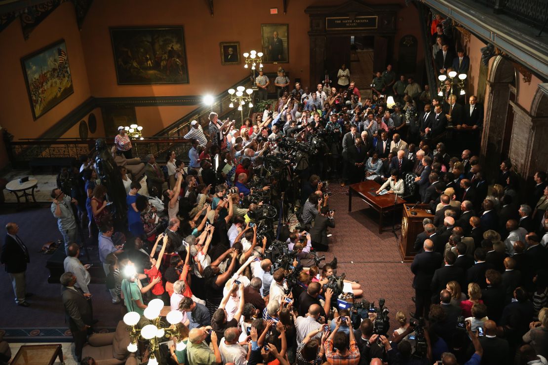 Haley signs a bill to remove the Confederate flag from the Statehouse on July 9, 2015, in Columbia, South Carolina.