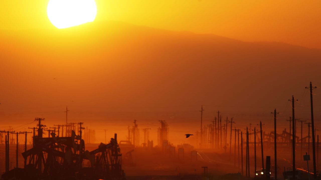 LOST HILLS, CA - MARCH 24:  The sun rises over an oil field over the Monterey Shale formation where gas and oil extraction using hydraulic fracturing, or fracking, is on the verge of a boom on March 24, 2014 near Lost Hills, California. Critics of fracking in California cite concerns over water usage and possible chemical pollution of ground water sources as California farmers are forced to leave unprecedented expanses of fields fallow in one of the worst droughts in California history. Concerns also include the possibility of earthquakes triggered by the fracking process which injects water, sand and various chemicals under high pressure into the ground to break the rock to release oil and gas for extraction though a well. The 800-mile-long San Andreas Fault runs north and south on the western side of the Monterey Formation in the Central Valley and is thought to be the most dangerous fault in the nation. Proponents of the fracking boom saying that the expansion of petroleum extraction is good for the economy and security by developing more domestic energy sources and increasing gas and oil exports.   (Photo by David McNew/Getty Images)