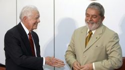 US former President Jimmy Carter (L) and Brazilian President Luiz Inacio Lula da Silva smile during a meeting at the Cultural Centre of the Bank of Brazil in Brasilia on May 4, 2009. Carter is in a three-day visit to Brazil.  AFP PHOTO/Evaristo SA (Photo by Evaristo SA / AFP) (Photo by EVARISTO SA/AFP via Getty Images)