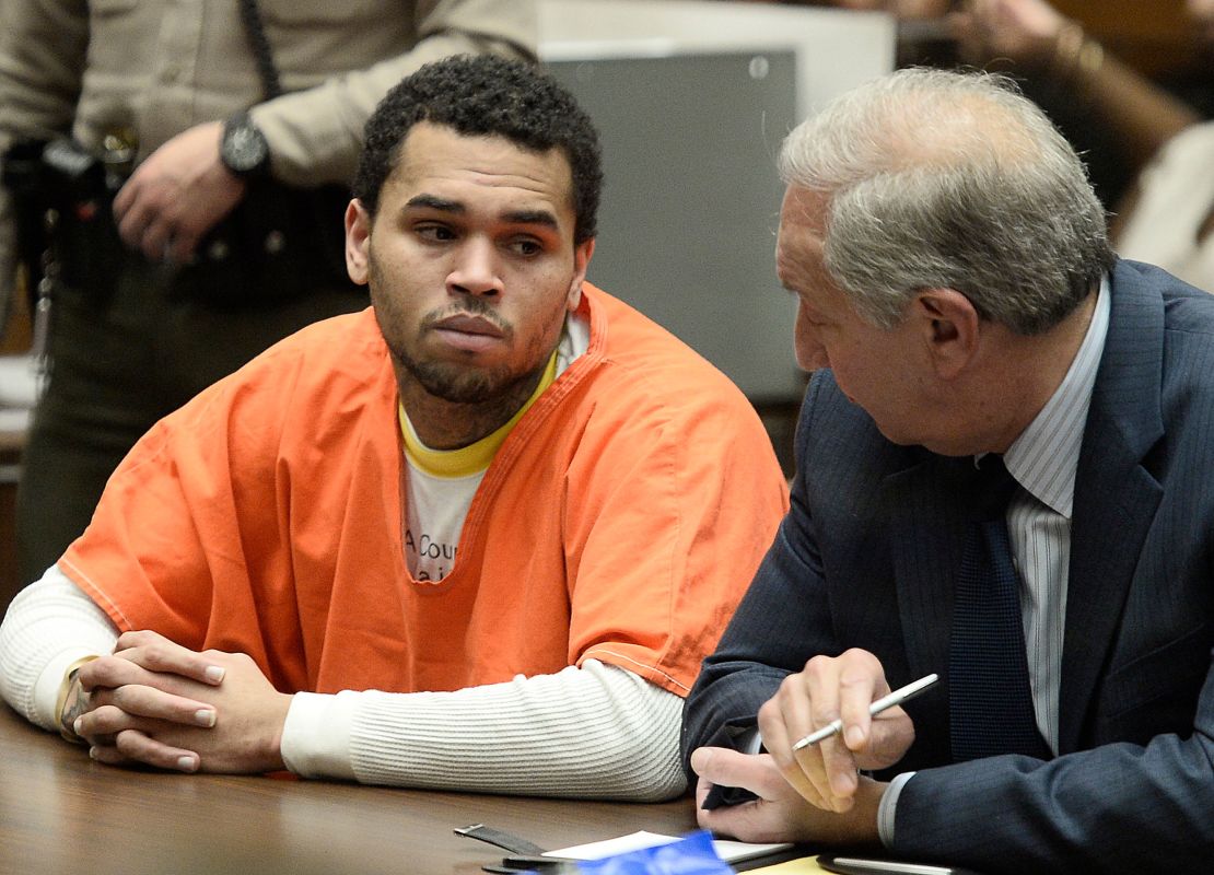 Chris Brown appears in court for a probation violation hearing with his attorney Mark Geragos in Los Angeles Court on May 9, 2014.