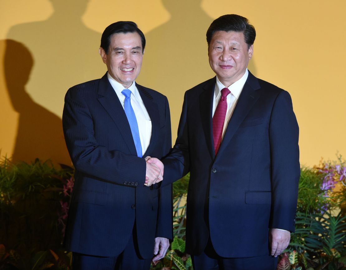 Chinese President Xi Jinping (R) shakes hands with Taiwan President Ma Ying-jeou (L) before their meeting at Shangrila hotel in Singapore on November 7, 2015. The leaders of China and Taiwan hold a historic summit that will put a once unthinkable presidential seal on warming ties between the former Cold War rivals. AFP PHOTO / Roslan RAHMAN (Photo credit should read ROSLAN RAHMAN/AFP via Getty Images)