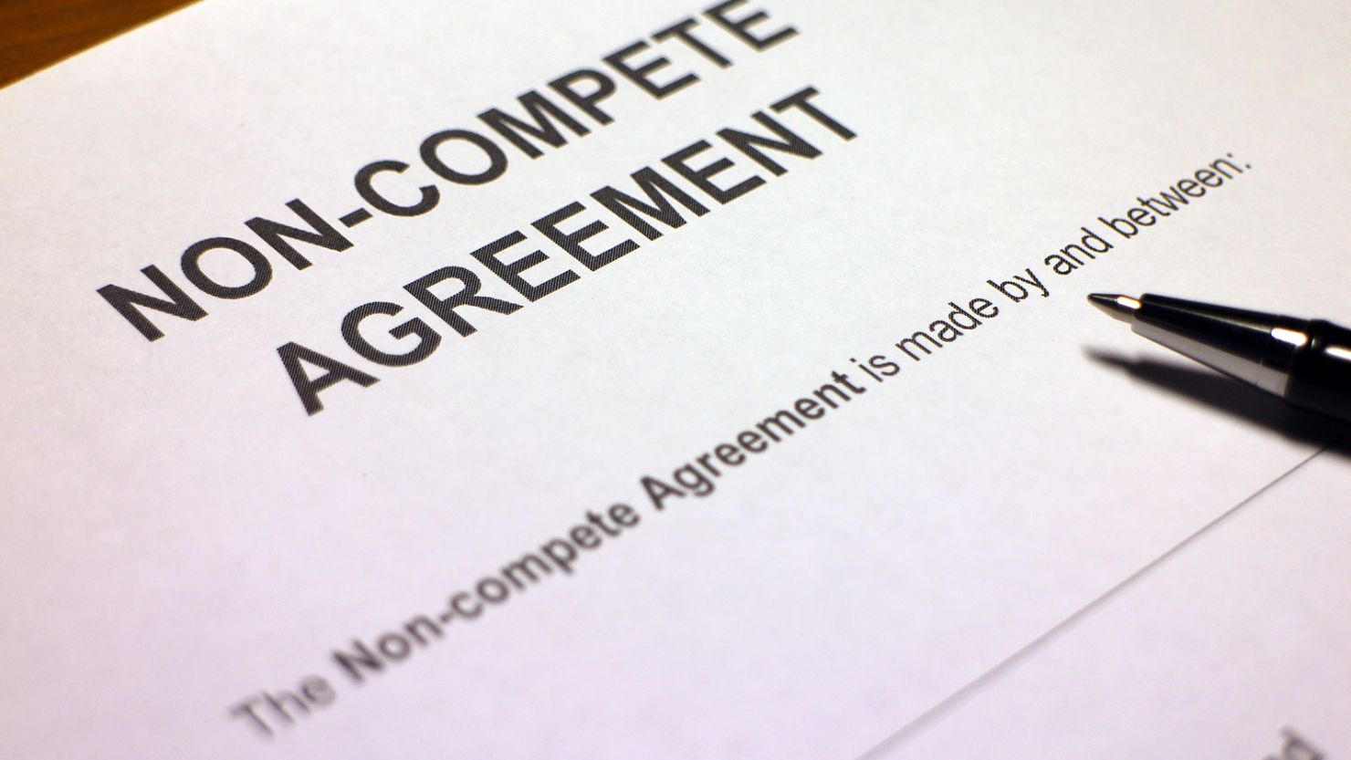 A photo illustration depicting a noncompete agreement.