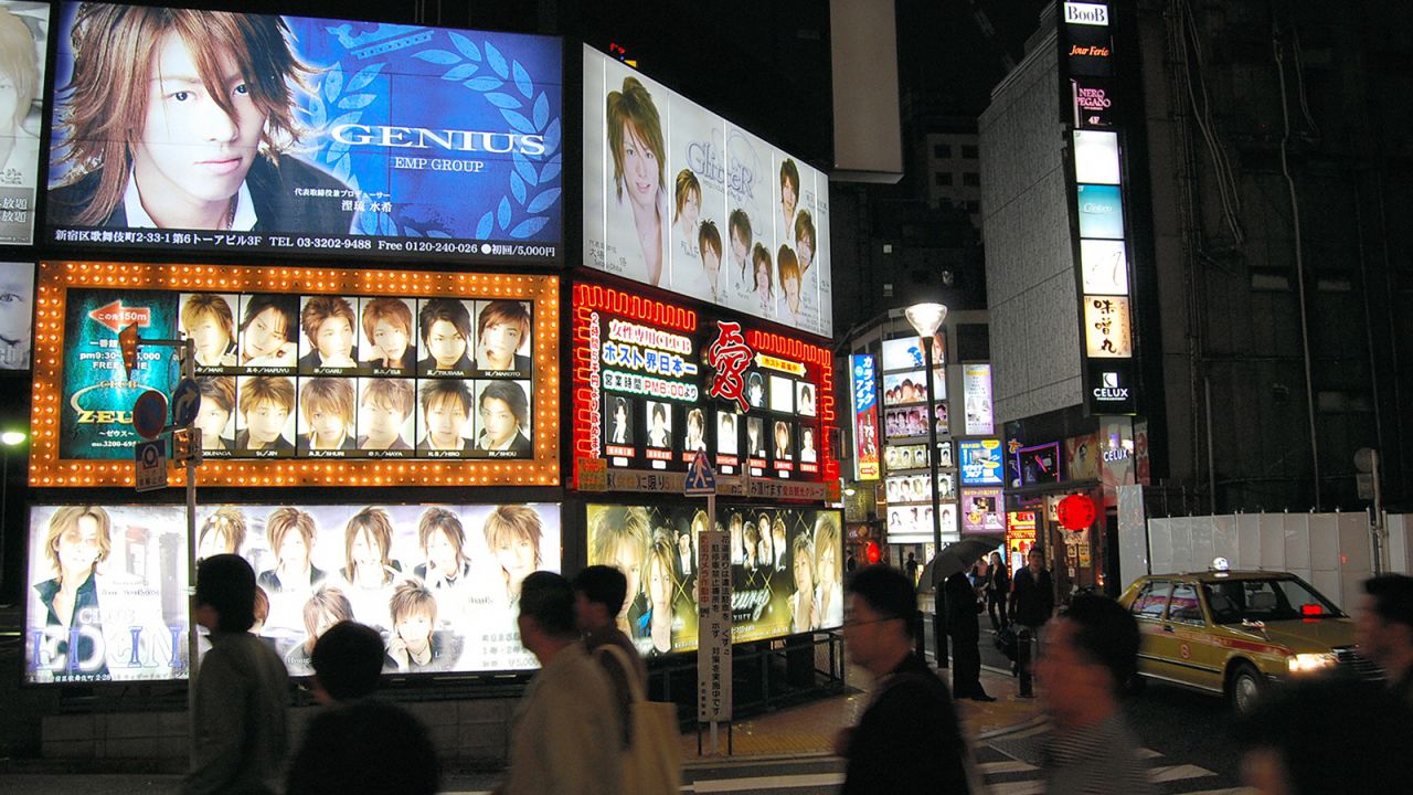 Advert boards of host clubs are illuminated at the Kabukicho entertainment area on November 5, 2007 in Tokyo, Japan.