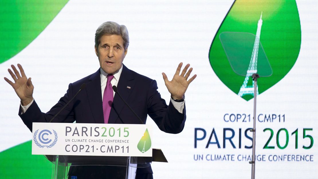 Then-US Secretary of State John Kerry speaks at a news conference at the COP21 Climate Conference in Le Bourget, north of Paris, on December 9, 2015.