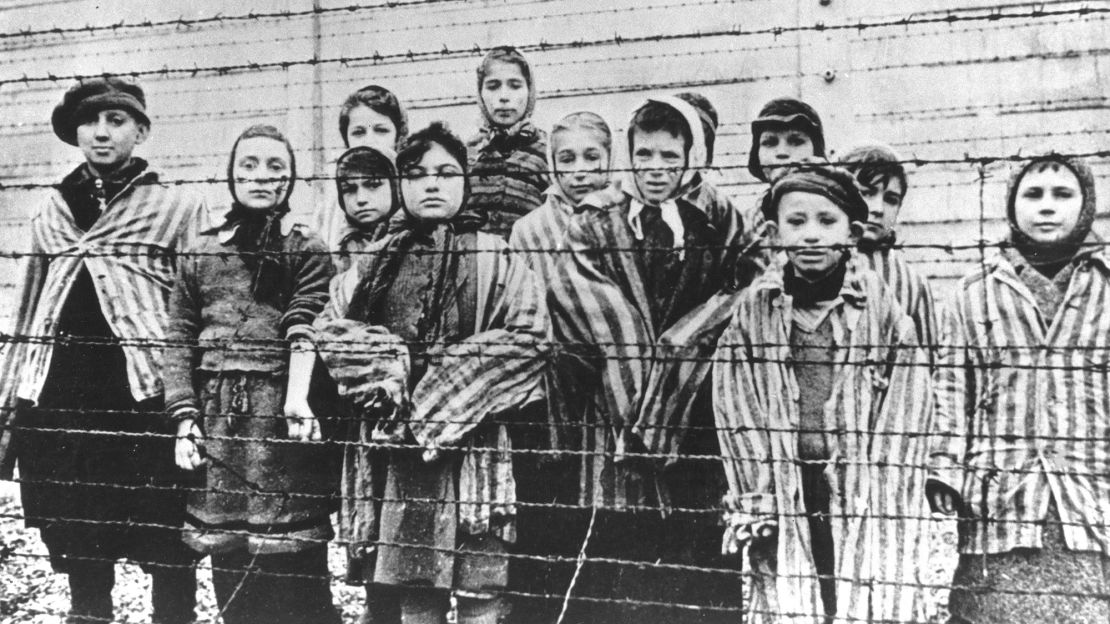 Survivors of the Auschwitz-Birkenau concentration camp after it was liberated in 1945.