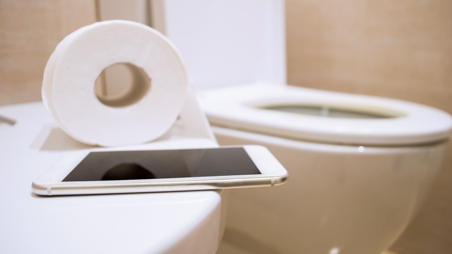 Leave your devices behind when you head to the bathroom, doctors say, warning too much time spent on the toilet can cause possible health problems.
