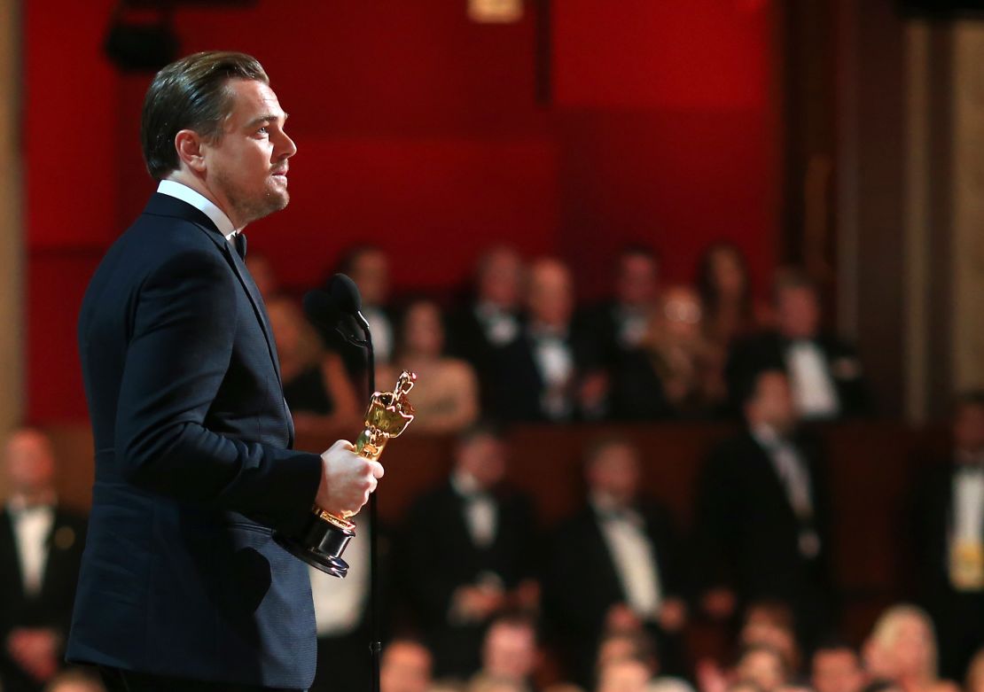 Leonardo DiCaprio accepts the Oscar for outstanding performance by a lead actor for "The Revenant" at the Academy Awards in 2016.