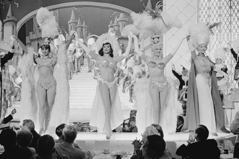 Nightly girls of the 1962 Folies Bergers dazzled patrons with resplendent costumes and exciting motion.