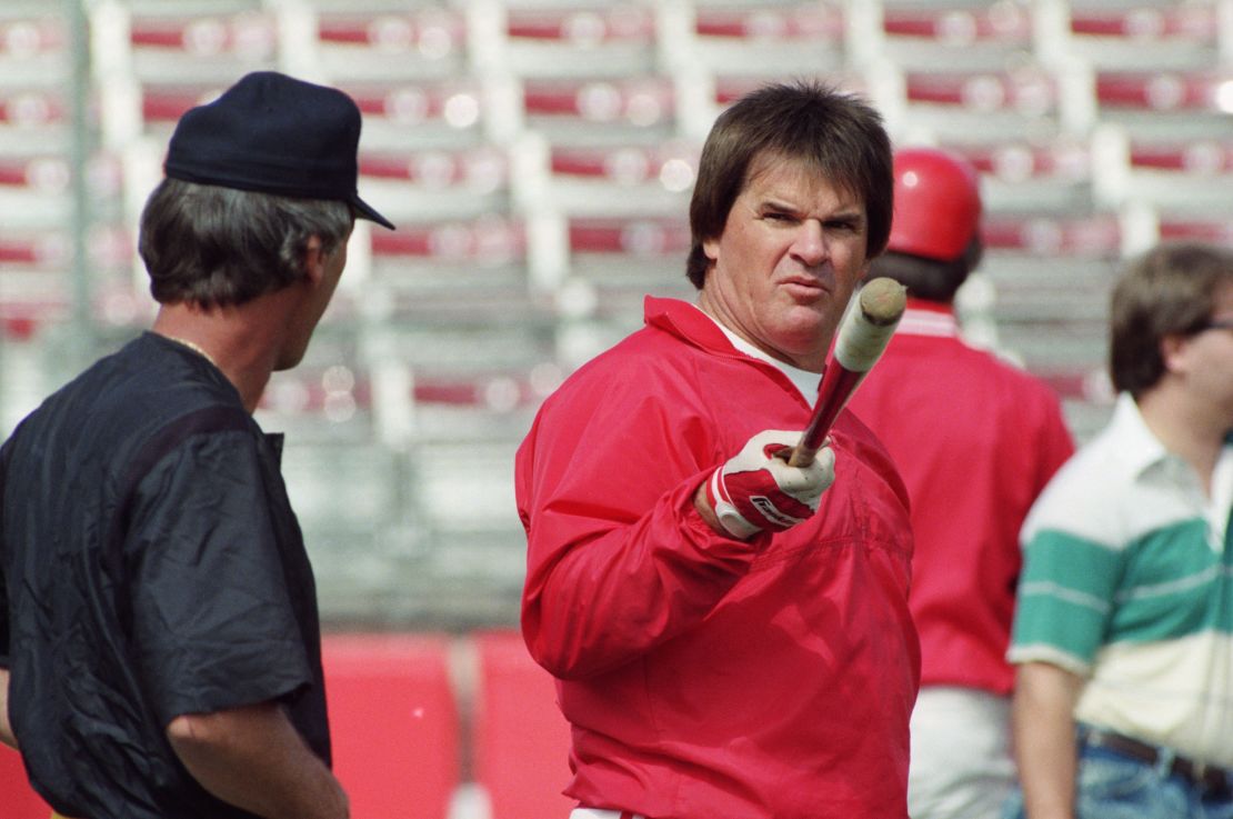 (Original Caption) 3/25/1989-Plant City, FL- Reds manager Pete Rose points his bat at a group of photographers prior to their game against the Pirates and has some uncomplimentary words to say of the group. Rose, under investigation by the commissioners office for gambling, has attracted a large press corp to the Reds facility.