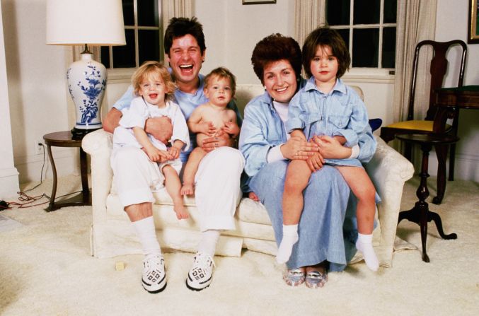 Osbourne and his wife, Sharon, pose with their three children — Kelly, Jack and Aimee — at home in the early 1990s.