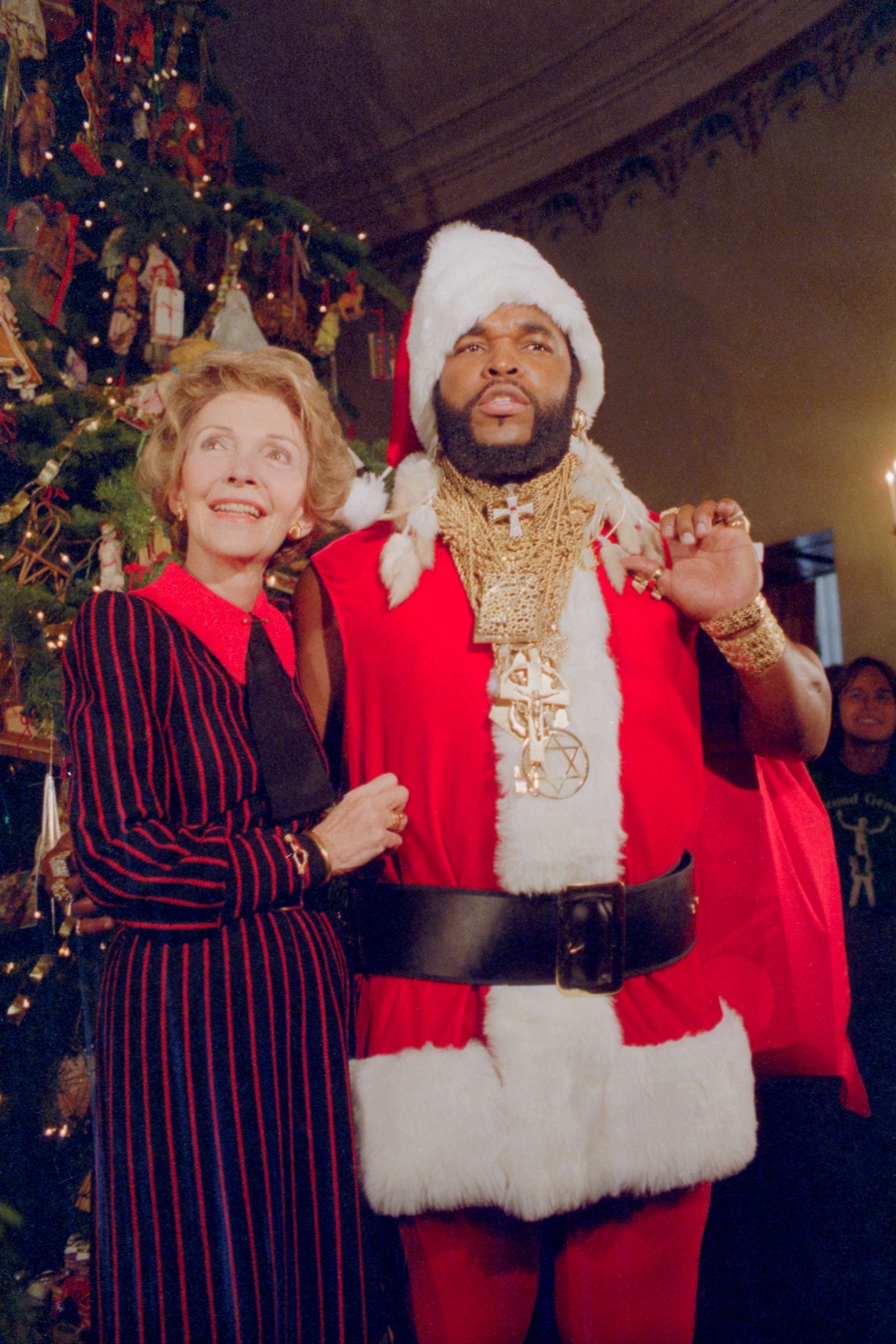 <strong>1983</strong>: Nancy Reagan posed with the actor Mr. T, dressed as Santa Claus, unveiling the White House Christmas decorations together.