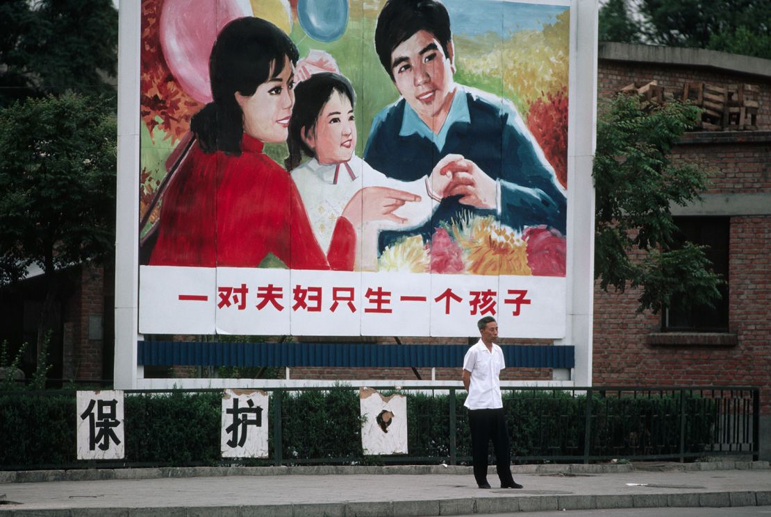 A billboard encourages Chinese couples to have only one child in Beijing on January 1, 1983.