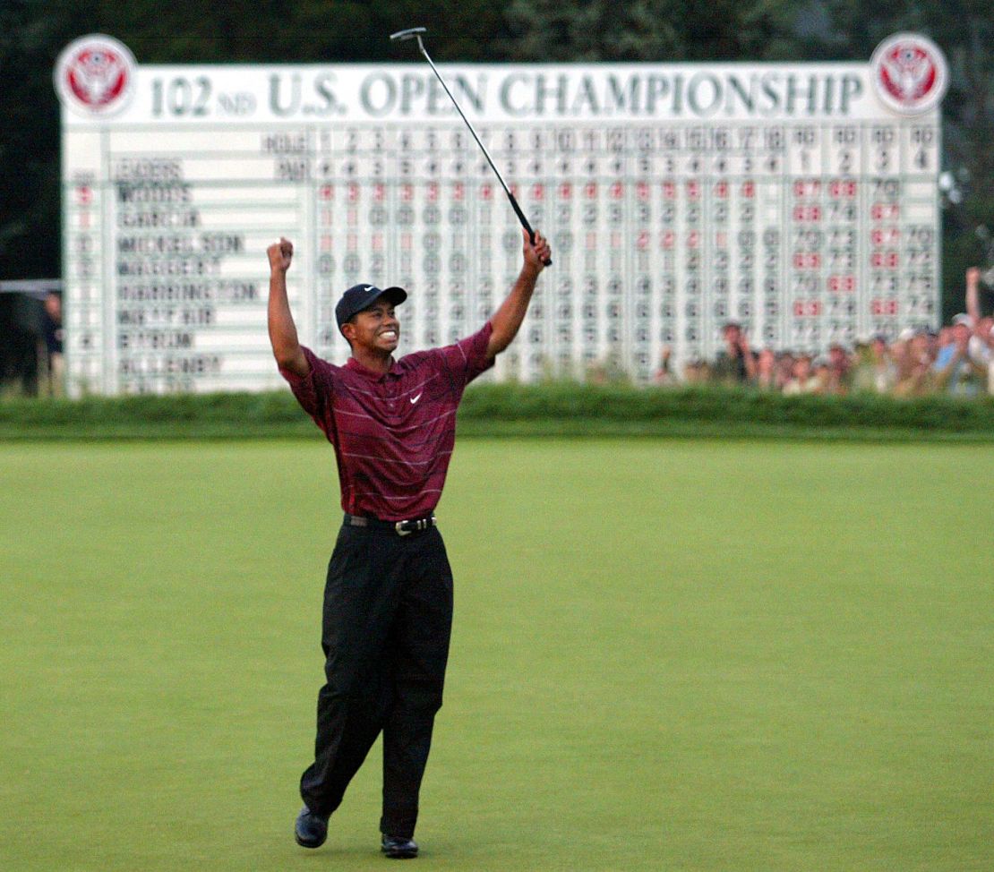 Woods celebrates sealing his second US Open title in 2002 after a three-shot victory at Bethpage Black in Farmingdale, New York.