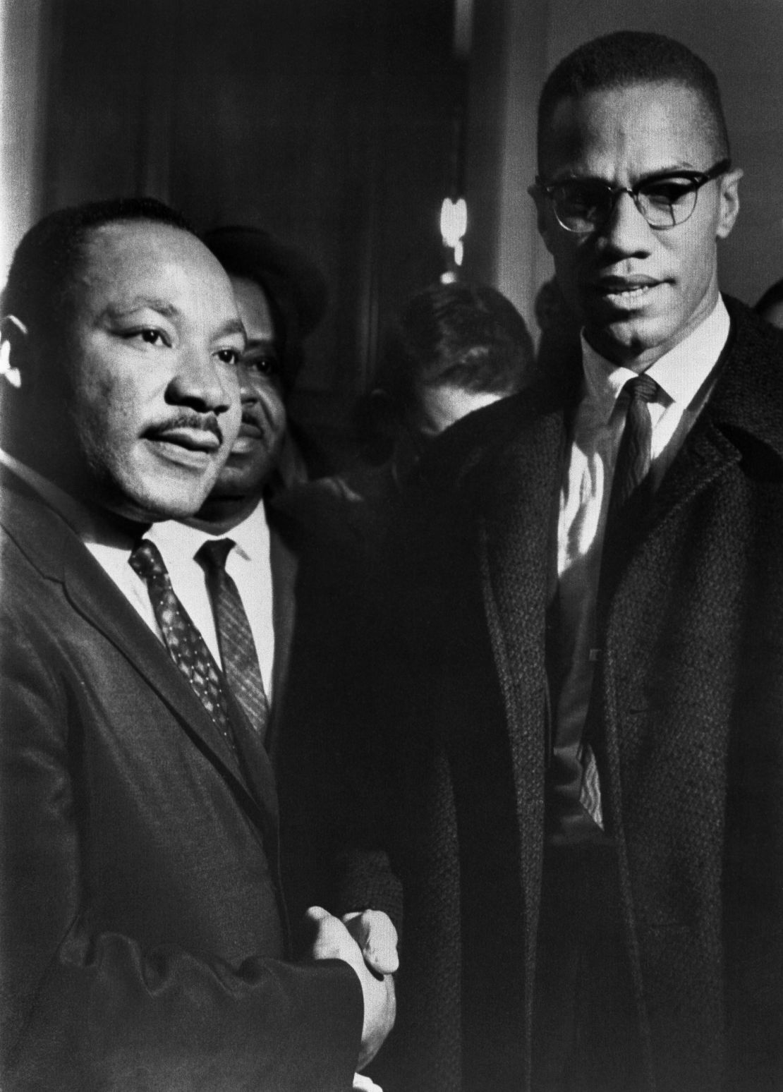 The brief, and only, meeting between Malcolm X and Martin Luther King Jr. in the halls of the US Capitol in Washington. Both men were attending a Senate hearing on the Civil Rights Act on March 26, 1964.