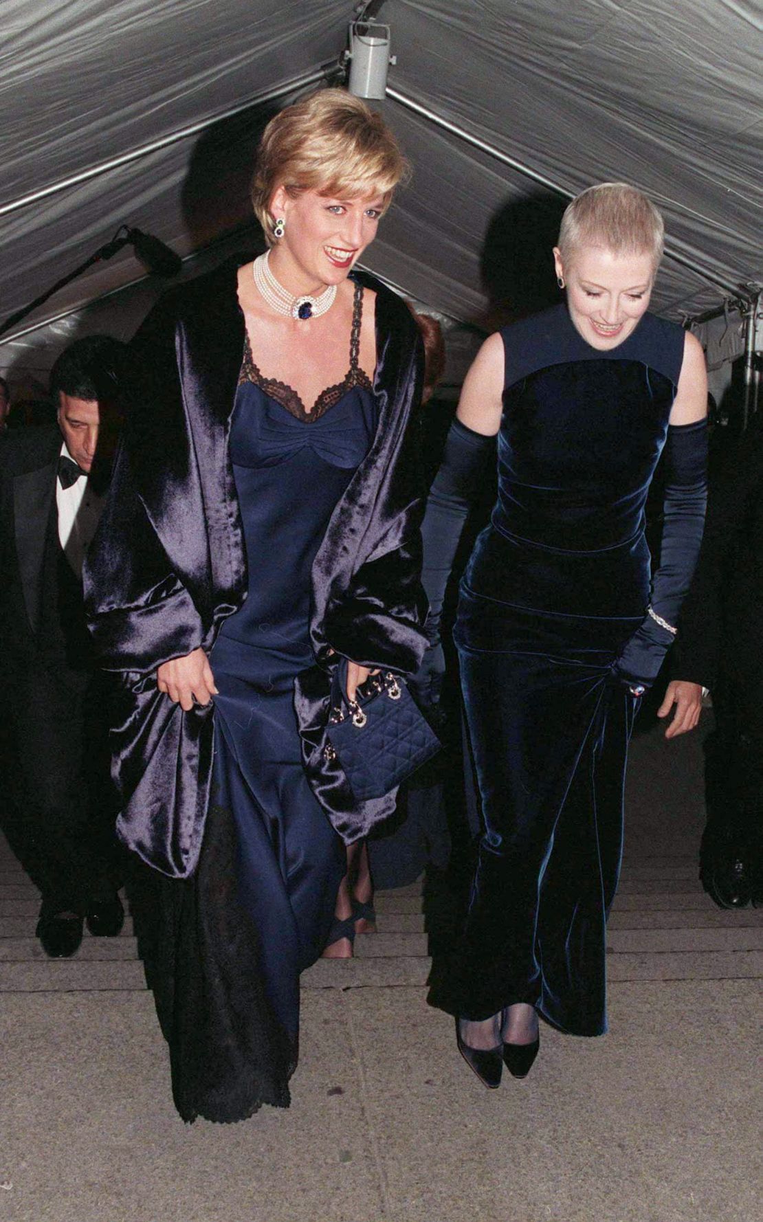 Princess Diana ascends the Metropolitan Museum of Art's famous stairs with her friend Liz Tilberis, who was the gala's chair.