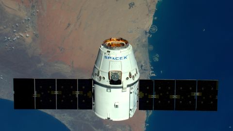 IN SPACE - APRIl 10: (EDITORIAL USE ONLY) (NO SALES) This handout image supplied by the European Space Agency (ESA), shows a view of The Palms, Dubai as the SpaceX Dragon spacecraft psses below, in an image taken by ESA astronaut Tim Peake from the International Space Station on April 10, 2016. ESA astronaut Tim Peake is performing more than 30 scientific experiments and taking part in numerous others from ESA's international partners during his six-month mission, named Principia, after Isaac Newtons ground-breaking Naturalis Principia Mathematica, which describes the principal laws of motion and gravity.  (Photo by Tim Peake / ESA/NASA via Getty Images) 