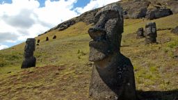 EASTER ISLAND, CHILE:  Picture of some of the 390 abandoned huge statues (moais in Rapa Nui language), in the hillside of the Rano Raraku volcano in Easter Island, 3700 km off the coast of Chile, 12 February 2005. The Chilean island, located in the Polynesian archipielago, has many archeological sites and its Rapa Nui National Park is included on UNESCO's World Heritage Site list since 1995.   AFP PHOTO/MARTIN BERNETTI  (Photo credit should read MARTIN BERNETTI/AFP via Getty Images)