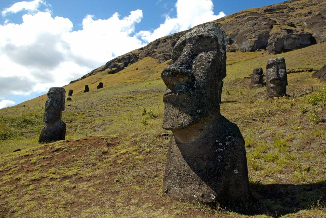 Large stone statues, known as moai in the indigenous Rapa Nui language, stand on a hill of the Rano Raraku volcano on Easter Island in the Pacific Ocean off the coast of Chile in 2005.