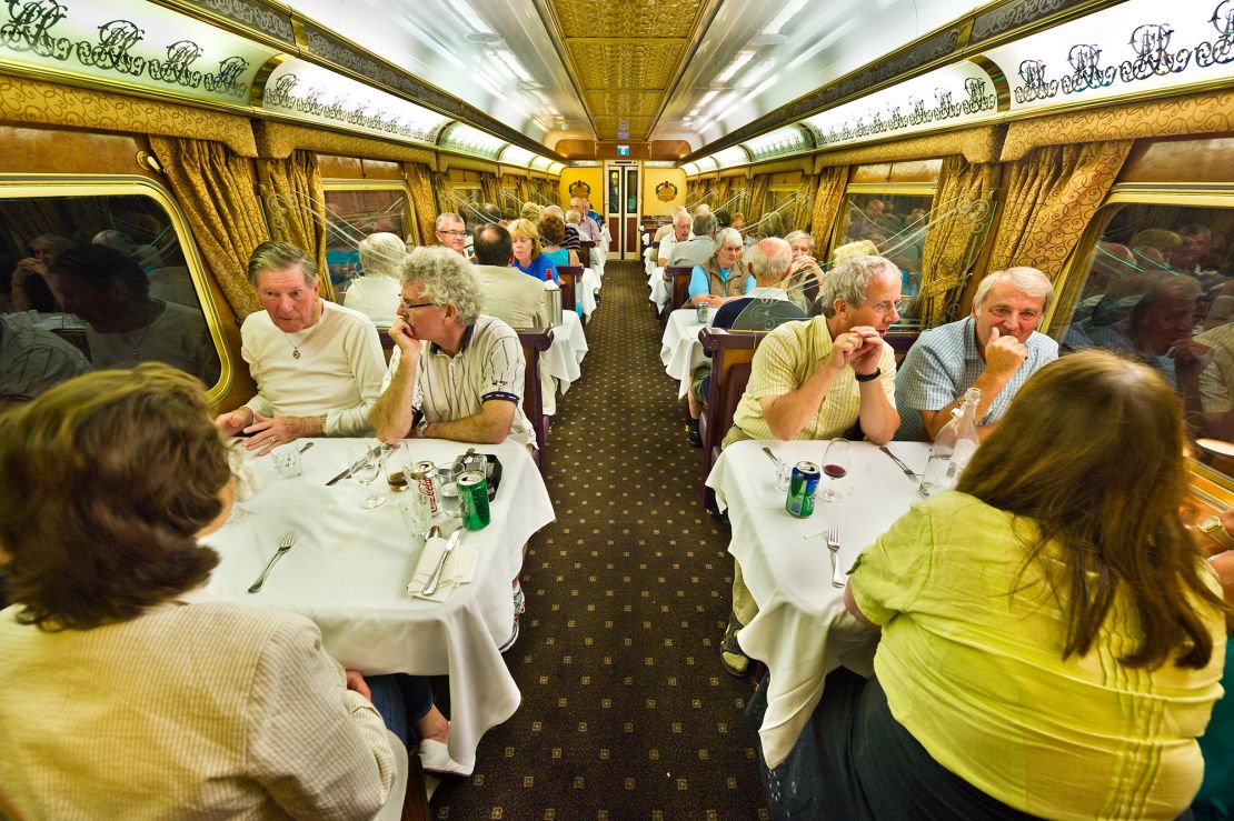 Dinner service at the Queen Adelaide Restaurant onboard the Ghan.