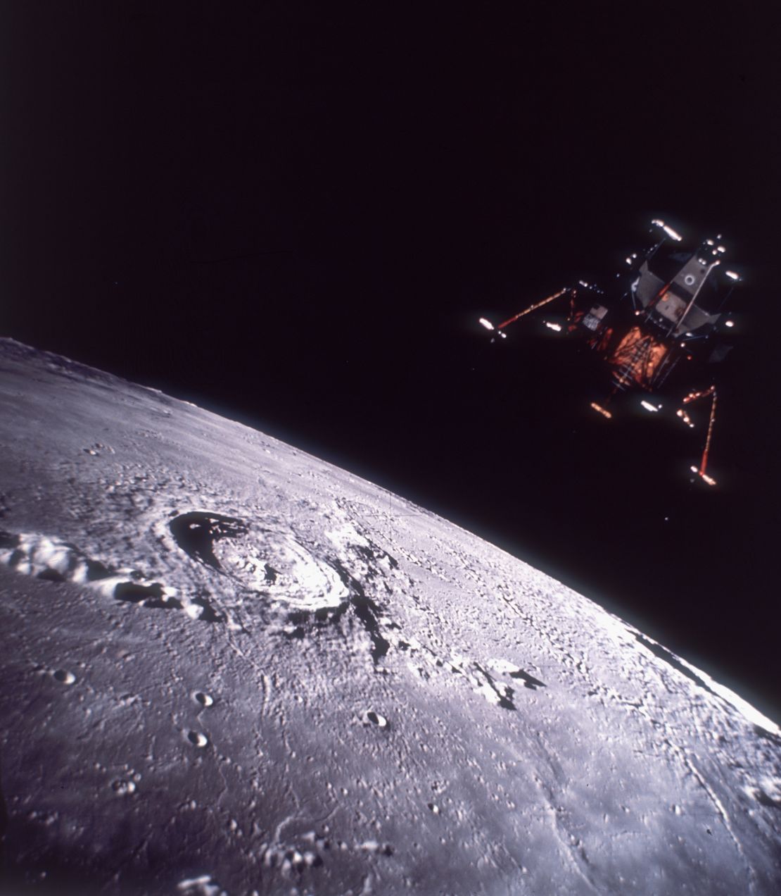 The Eagle lunar lander — carrying the first humans to reach the moon — descends during the Apollo 11 mission on July 20, 1969. This is a composite image comprised of two separate shots.