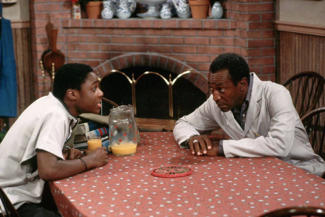 Warner and Bill Cosby in a scene from the