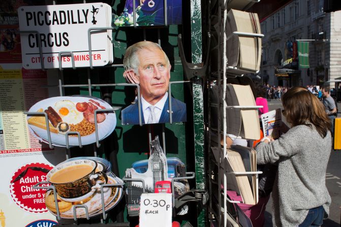 <strong>Wish you were here:</strong> Postcards of full English breakfasts are on sale alongside ones of King Charles in London souvenir shops.