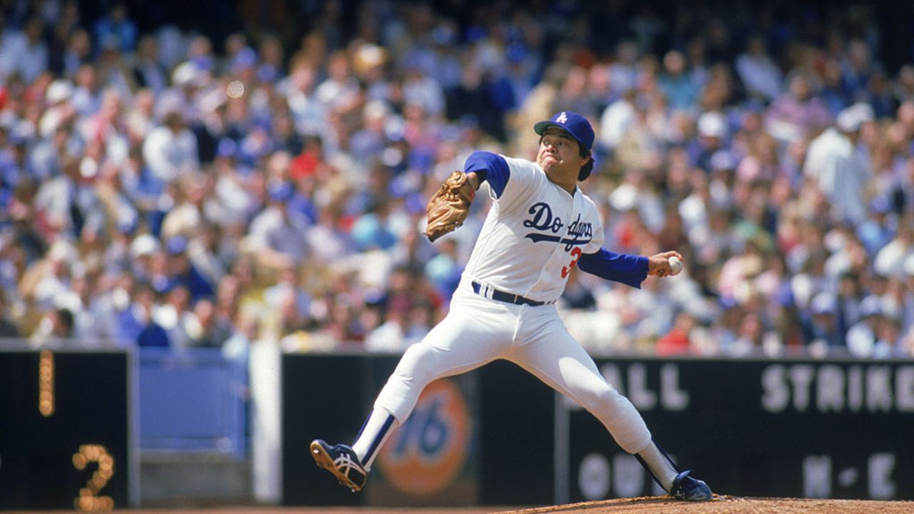 LOS ANGELES - 1985: Pitcher Fernando Valenzuela #34 of the Los Angeles Dodgers winds up for a pitch during a 1985 MLB season game at Dodger Stadium in Los Angeles, California. (Photo by: Rick Stewart/Getty Images)