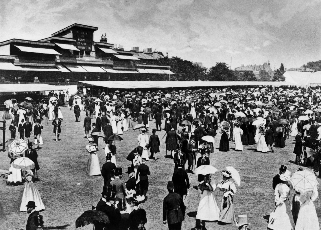 Spectators at Lord's Cricket Ground during the lunch interval in 1895 at the annual Eton vs. Harrow match.